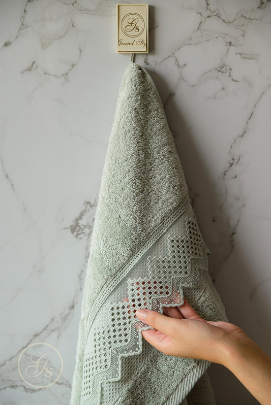 Cotton towels and bathrobes with elegant details and luxurious material